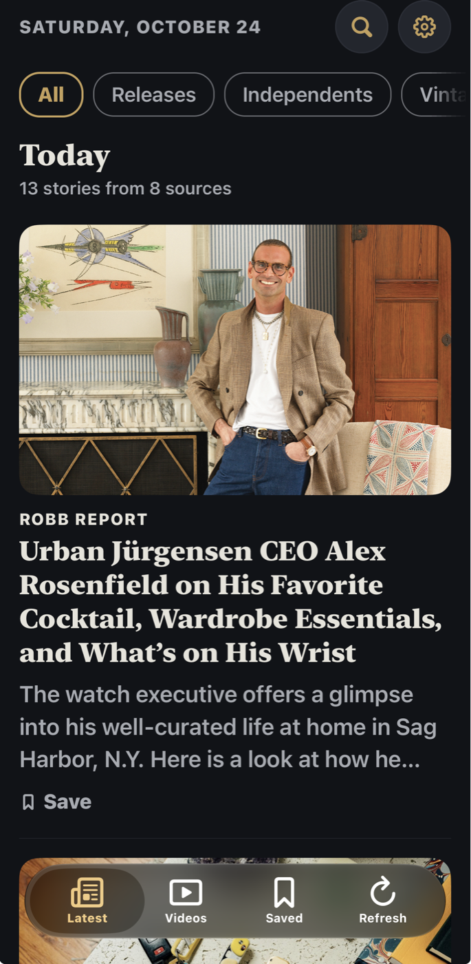 The Latest screen of Watch Vault Media on an iPhone: topic chips along the top, then today&rsquo;s stories, newest first, each with the publisher&rsquo;s picture, headline and short summary.